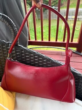 Baguette silhouette Daniella Moda leather bags  never use